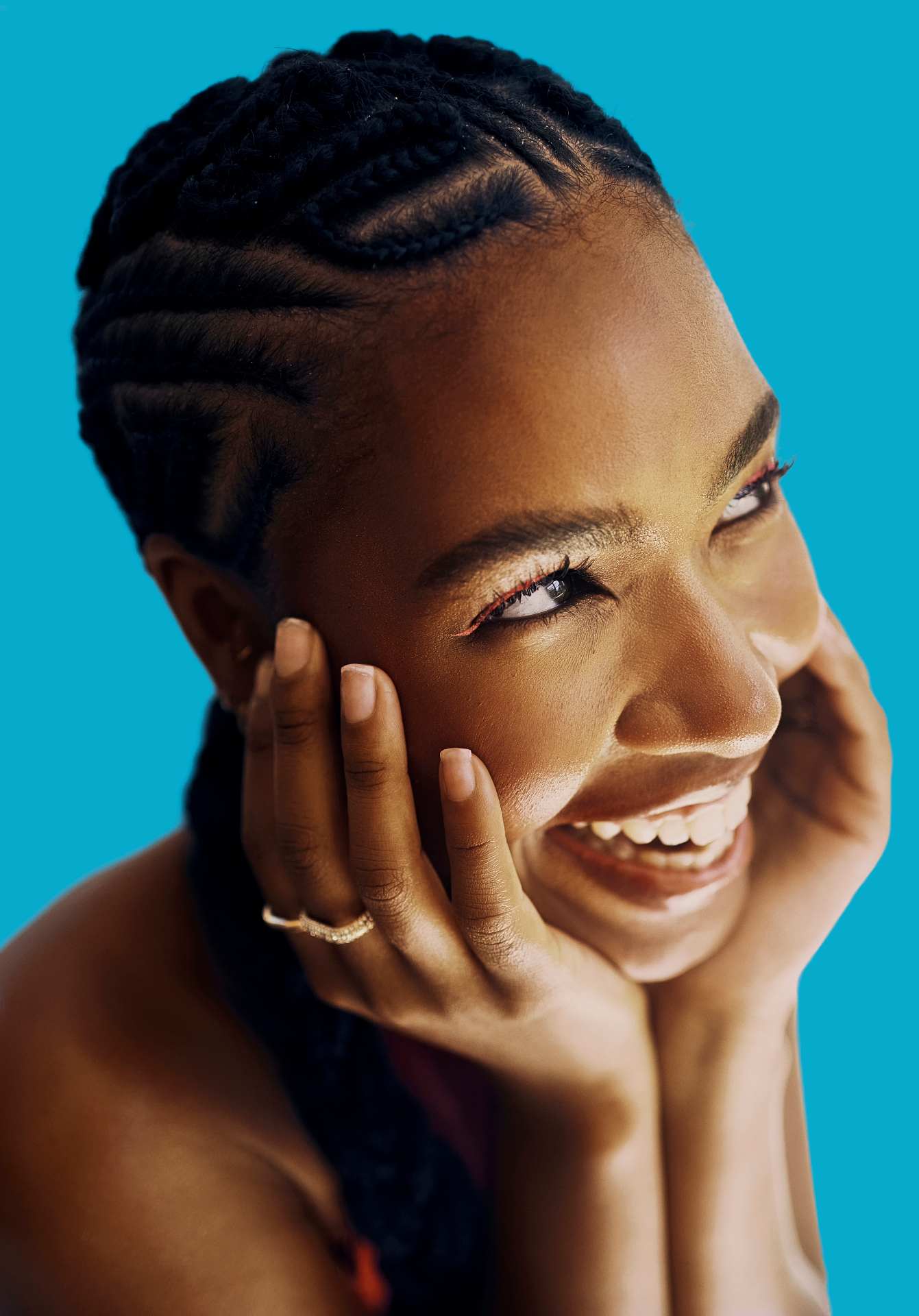Profile of woman with sculpted cornrow braids